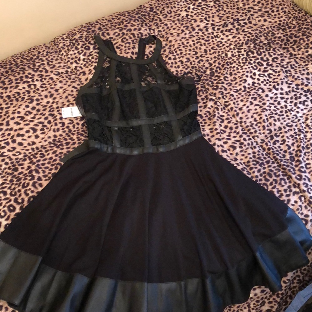 Woman’s black Bebe party dress